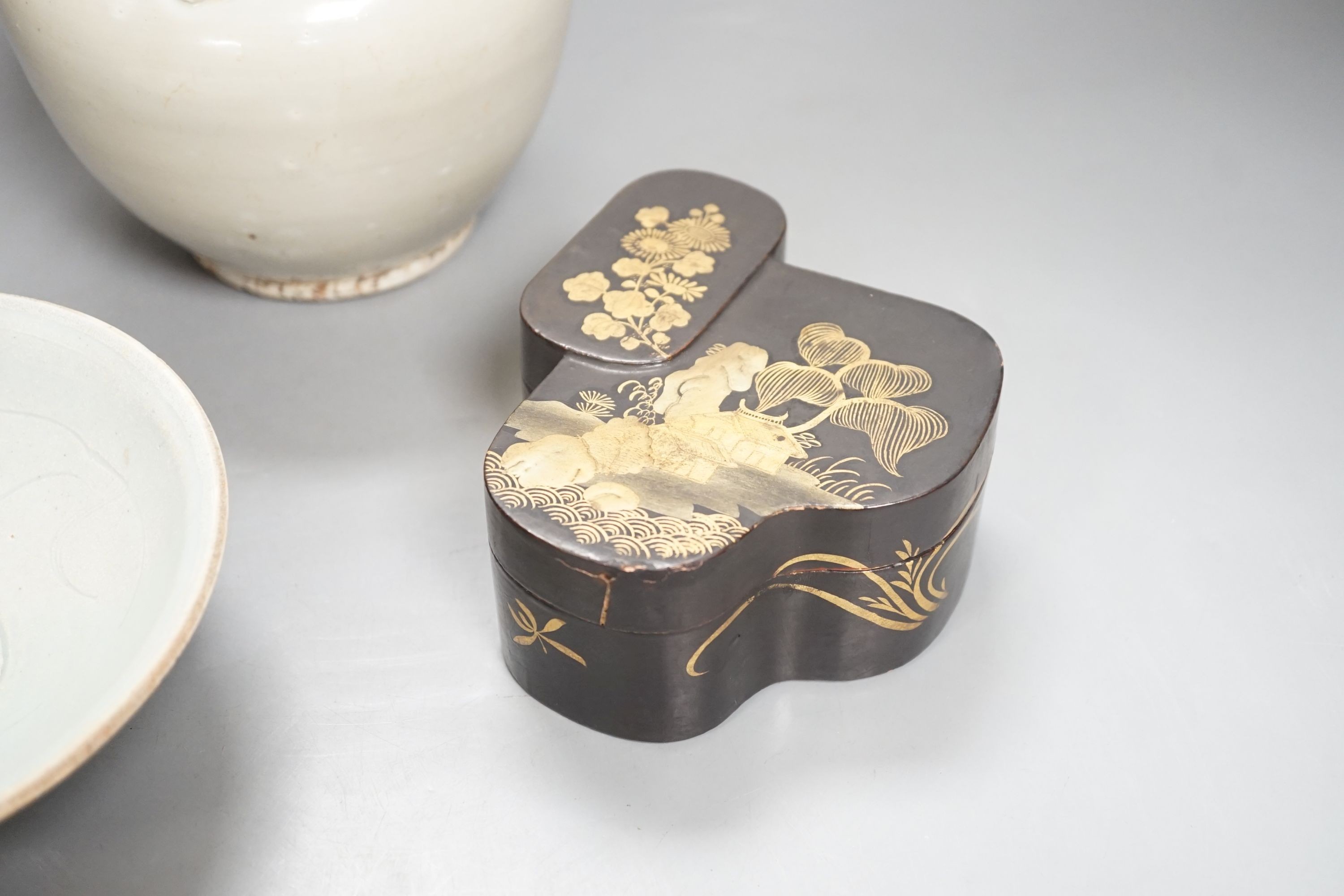 A Chinese Qingbai type bowl, a Ding type jar and a Japanese lacquer box, tallest 15cm